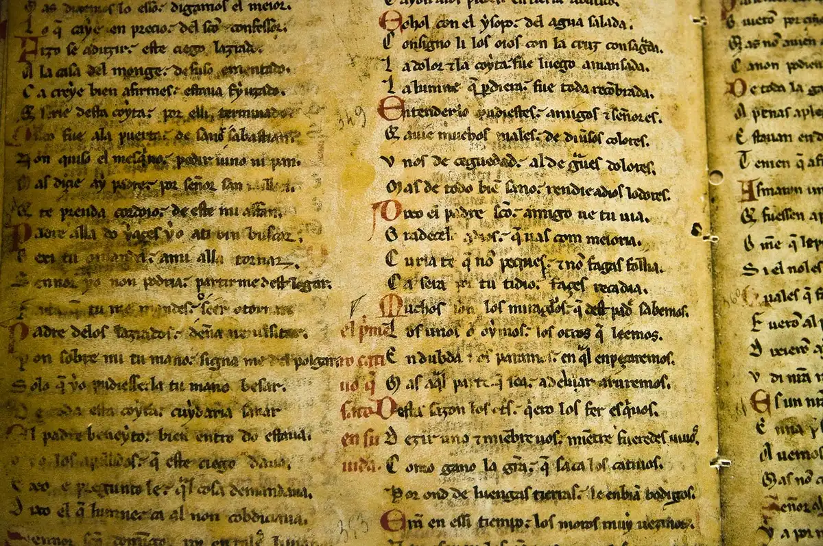 Illustration médiévale montrant une main stylisée dans un manuscrit