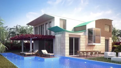 Terrasse d'un appart'hôtel en journée avec guide de Minorque et piscine en arrière‑plan